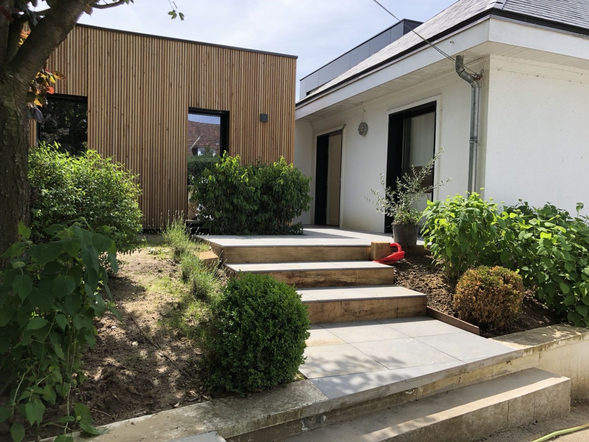 Double extension bois d'une maison à Hem